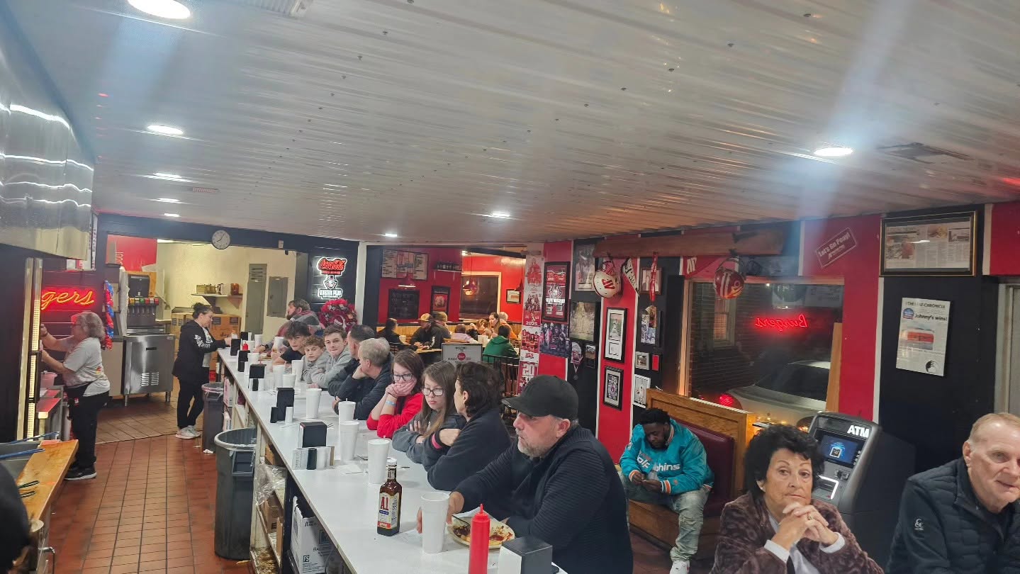 Families dining at Johnny's Big Burger